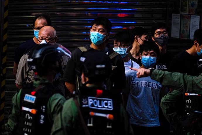 06 September 2020, China, Hong kong: Riot cops detain protesters during an anti government protest after the government delayed a Legislative Council election for one year citing the coronavirus (COVID-19). Photo: Keith Tsuji/ZUMA Wire/dpa