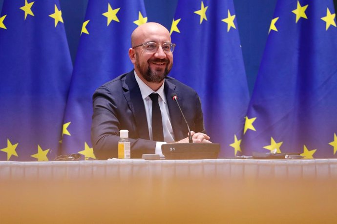 HANDOUT - 07 December 2020, Belgium, Brussels: EU Council President Charles Michel attends a video conference meeting with President of the European Commission Usrsula von der Leyen, German Chancellor Angela Merkel and French President Emmanuel Macron. 