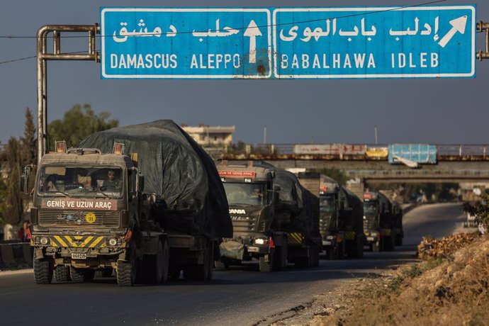 20 October 2020, Syria, ---: Military vehicles of the Turkish troops drive on the M4 Motorway, near the city of Arihah, after they began their withdrawal from their largest observation pointin Syria, located in the town of Morek, which now falls under 