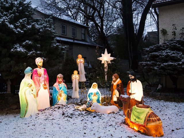 Christmas Nativity scene covered with snow is seen at a house on Christmas day on December 25, 2017 in Riverdale neighborhood of the Bronx borough of New York City.