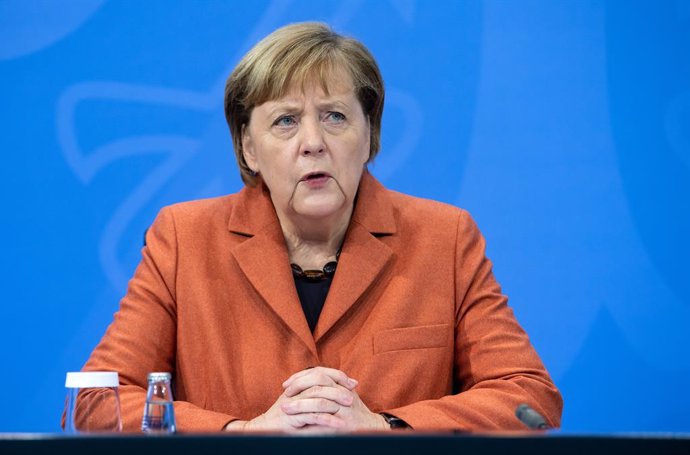 13 December 2020, Berlin: German Chancellor Angela Merkel speaks during a press conference at the Federal Chancellery following consultations with the heads of government of the federal states. In view of a surge in coronavirus infections, a nationwide 