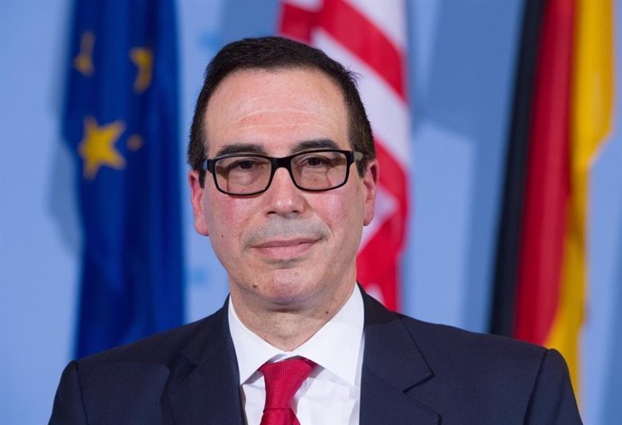 FILED - 16 March 2017, Berlin: United States Secretary of the Treasury Steven Mnuchin attends a press conference. Mnuchin said he believes the White House is close to reaching a deal on an initial aid package to help the US economy deal with the effects