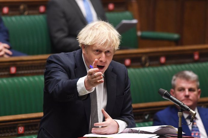 HANDOUT - 16 December 2020, England, London: UK Prime Minister Boris Johnson speaks during Prime Minister's Questions in the House of Commons. Photo: Jessica Taylor/Uk Parliament via PA Media/dpa - ATTENTION: editorial use only and only if the credit me