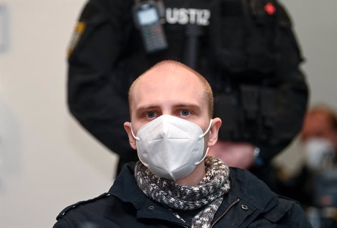 21 December 2020, Saxony-Anhalt, Magdeburg: The defendant Stephan Balliet sits in the hall of the Regional Court before the beginning of his trial over accusations of 13 criminal offences, including murder and attempted murder during the October 2019 Ha