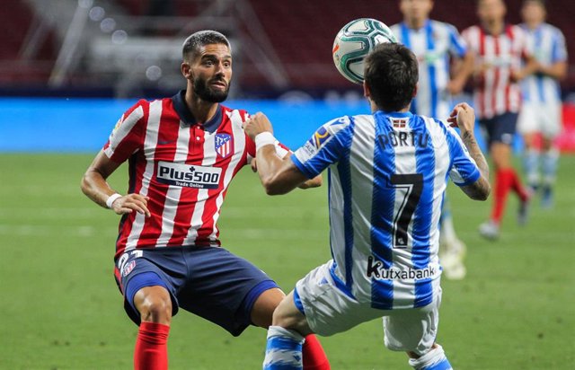 Portu y Yannick Carrasco en un Atlético-Real Sociedad