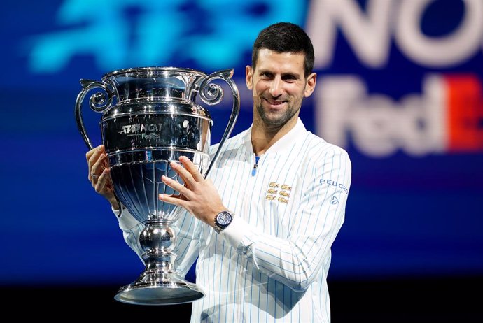 15 November 2020, England, London: Serbian tennis player Novak Djokovic poses with his year end ATP number one trophy on the first day of the ATP World Tour Finals tennis tournament at the O2 Arena. Photo: John Walton/PA Wire/dpa