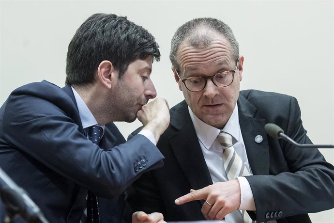 26 February 2020, Italy, Rome: Roberto Speranza (L), Italian Minister of Health, speaks with Hans Kluge, Chief of World Health Organization Europe Region, during the Coronavirus Summit with representatives of the EU, WHO and ECDC.