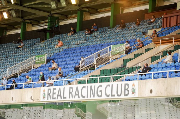 Fans in the stands during the first soccer match with the public after the COVID19 pandemic in SmartBank League between Racing de Santander and Athletic Club de Bilbao B at El Sardinero Stadium on September 23, 2020, in Santander, Spain.