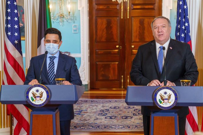 HANDOUT - 24 November 2020, US, Washington: US Secretary of State Mike Pompeo (R)and Kuwaiti Foreign Minister Sheikh Ahmad Nasser al-Mohammad al-Sabah hold a joint press conference following their meeting at the US Department of State. Photo: Ron Przys