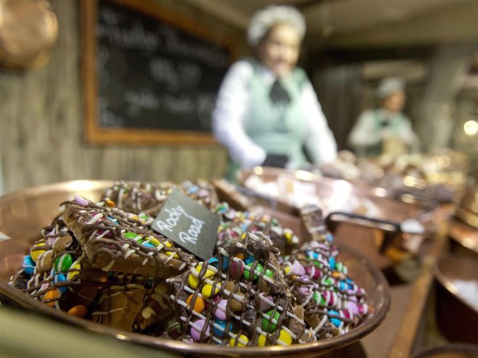 Venodrs sell nougat in their stand at the Cologne Christmas Market on November 28, 2018 in Cologne, Germany.
