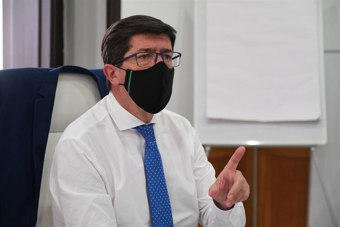 El vicepresidente de la Junta de Andalucía y consejero de Turismo, Regeneración, Justicia y Administración Local, Juan Marín en la reunión del Consejo Escolar de Andalucía. Sevilla a 28 de diciembre 2020