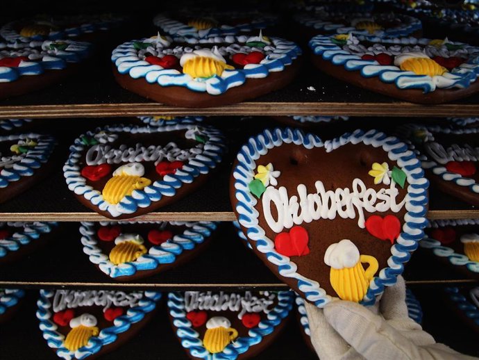 A confectioner inspects a gingerbread heart to be sold at the Munich Oktoberfest on September 8, 2011 in Aschheim near Munich, Germany. The world's largest beer festival takes place in Munich and will last this year from September 17 until October 3.