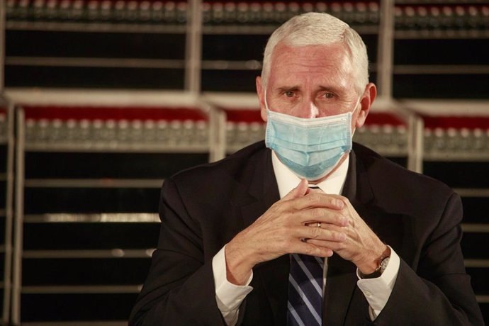 15 December 2020, US, Bloomington: US Vice President Mike Pence wearing a face mask speaks during a round table discussion at Catalent Biologics, where coronavirus (COVID-19) vaccine vials are being filled. Photo: Jeremy Hogan/SOPA Images via ZUMA Wire/