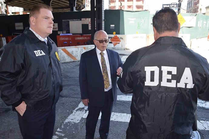 April 23, 2019 - New York, New York, United States: Drug Enforcement Administration (DEA) agents lead former chief executive of the Rochester Drug Cooperative (RDC) Laurence "Larry" F. Doud III into their NYC office after he turned himself in to face fe