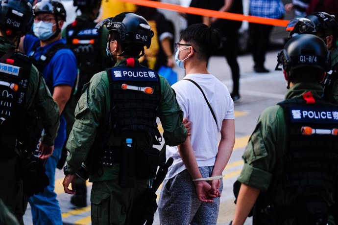 06 September 2020, China, Hong kong: Riot cops detain a protester during an anti government protest after the government delayed a Legislative Council election for one year citing the coronavirus (COVID-19). Photo: Keith Tsuji/ZUMA Wire/dpa