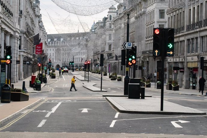 25 December 2020, England, London: London's Regents Street Street is seen empty on Christmas Day amid Coronavirus lockdown. Photo: Aaron Chown/PA Wire/dpa