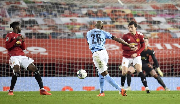 06 January 2021, England, Manchester: Manchester City's Fernandinho scores his side's second goal during the English Carabao Cup Semi-Final soccer match between Manchester United and Manchester City at the Old Trafford. Photo: Peter Powell/PA Wire/dpa
