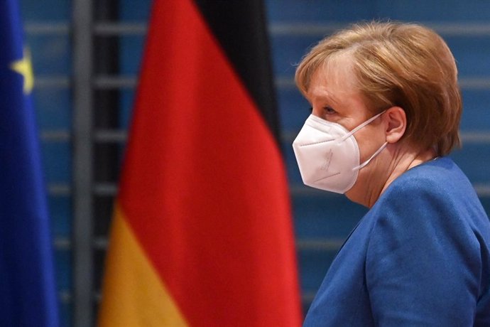 06 January 2021, Berlin: German Chancellor Angela Merkel wearing a face mask arrives to attend the cabinet meeting at the Federal Chancellery. Photo: John Macdougall/POOL afp/dpa