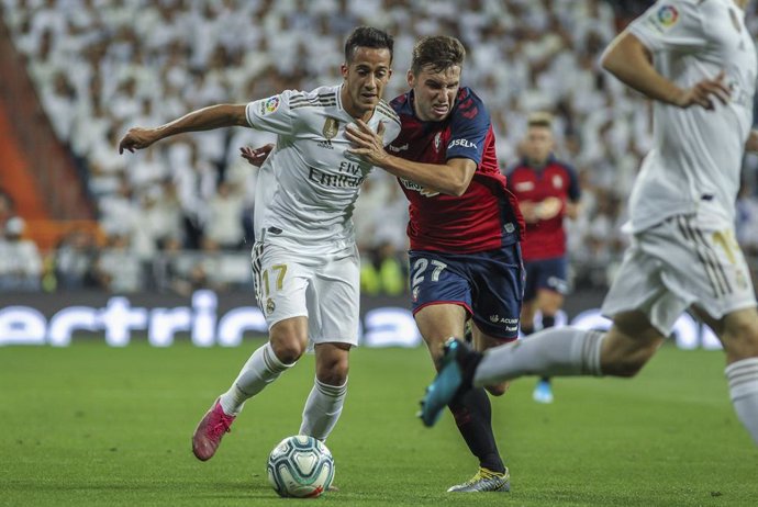 Lucas Vazquez of Real Madrid and Moncayola of Osasuna in action during La Liga Spanish championship football match between Real Madrid and Osasuna, September 25th, at Santiago Bernabeu stadium, in Madrid, Spain.