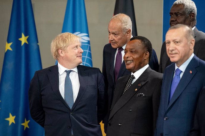 19 January 2020, Berlin: (L-R) British Prime Minister Boris Johnson, Secretary General of the Arab League Ahmed Aboulgheit, President of the Congo Denis Sassou Nguesso, Chairman of the African Union Moussa Faki and Turkish President Recep Tayyip Erdogan