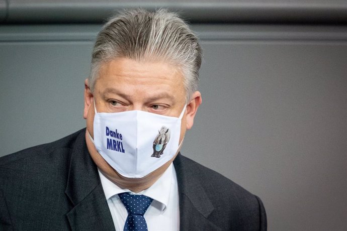 30 October 2020, Berlin: Alternative for Germany (AfD) member of the Bundestag Thomas Seitz wears a face mask with the inscription "Danke MRKL" (Thank you MRKL) during a plenary session at the German Bundestag. Photo: Kay Nietfeld/dpa