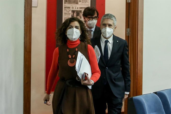 La ministra de Hacienda, María Jesús Montero, el ministro de Interior, Fernando Grande-Marlaska y el ministro de Sanidad, Salvador Illa