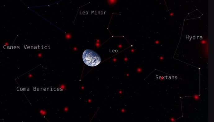 Esta imagen muestra a la Tierra rodeada por las enanas marrones más cercanas, mostradas en rojo, contra el telón de fondo de las constelaciones circundantes.