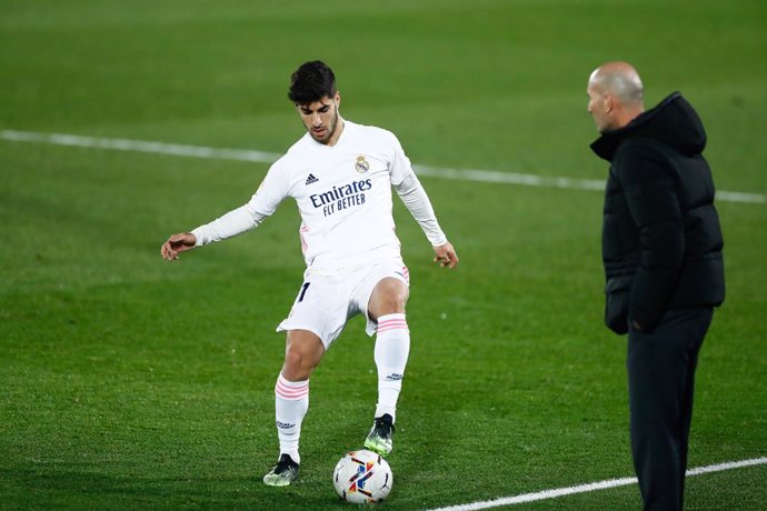 Marco Asensio y Zinedine Zidane