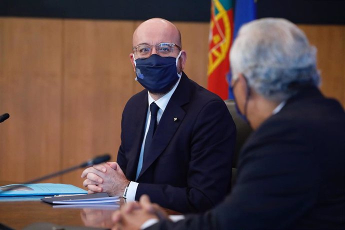 HANDOUT - 05 January 2021, Portugal, Lisbon: European Council President Charles Michel attends a meeting with Portuguese Prime Minister Antonio Costa (R) ahead of the inauguration of the Portuguese Presidency of the EUCouncil, at the Belem Cultural cen