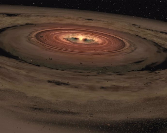 La concepción de un artista muestra un disco protoplanetario de polvo y gas alrededor de una estrella joven.