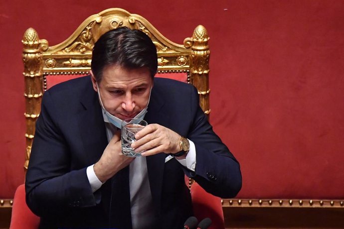 19 January 2021, Italy, Rome: Italian Prime Minister Giuseppe Conte drinks water during his speech at the Senate, ahead of a vote of confidence following a breakdown of government alliances after the Italia Viva party of former prime minister Matteo Ren