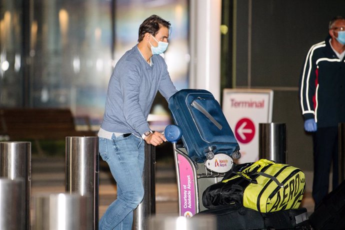 Rafael Nadal arrives at Adelaide Airport ahead of the Australian Open tennis tournament, Adelaide, Thursday, January 14, 2021. Arriving players will serve a 14-day quarantine period ahead of the scheduled major set to get underway on February 8. (AAP Im