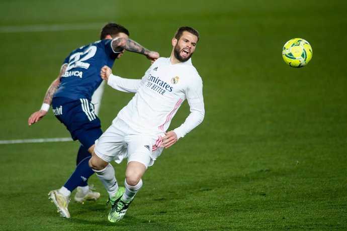 Nacho Fernandez of Real Madrid and Santi Mina of Celta in action during the spanish league, La Liga Santander, football match played between Real Madrid and Celta de Vigo at Ciudad Deportiva Real Madrid on january 02, 2021, in Valdebebas, Madrid, Spain