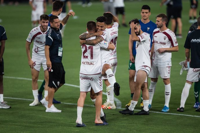 Albacete players celebrate their stay in the SmartBank League during the spanish league, LaLiga, football match played between Cadiz Club Futbol and Albacete Balompie at Ramon de Carranza Stadium on July 20, 2020 in Cadiz, Spain.