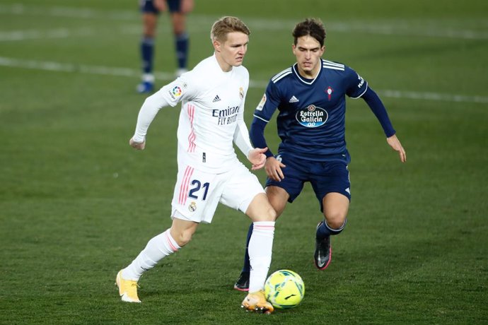 Martin Odegaard of Real Madrid and Denis Suarez of Celta in action during the spanish league, La Liga Santander, football match played between Real Madrid and Celta de Vigo at Ciudad Deportiva Real Madrid on january 02, 2021, in Valdebebas, Madrid, Spain