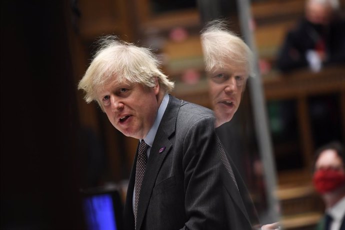 HANDOUT - 27 January 2021, United Kingdom, London: UK Prime Minister Boris Johnson speaks during Prime Minister's Questions in the House of Commons. Photo: Jessica Taylor/Uk Parliament via PA Media/dpa - ATTENTION: editorial use only and only if the cre