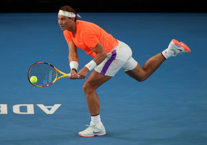 Rafael Nadal of Spain in action against Domini Thiem of Austria  during the A Day at the Drive tennis event at Memorial Drive Tennis Centre in Adelaide, Friday, January 29, 2021. (AAP Image/Kelly Barnes) NO ARCHIVING, EDITORIAL USE ONLY