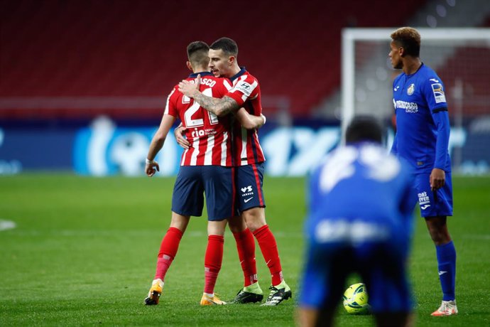 Yannick Carrasco and Mario Hermoso of Atletico de Madrid celebrate the victory during the spanish league, La Liga Santander, football match played between Atletico de Madrid and Getafe CF at Wanda Metropolitano stadium on december 30, 2020, in Madrid, S