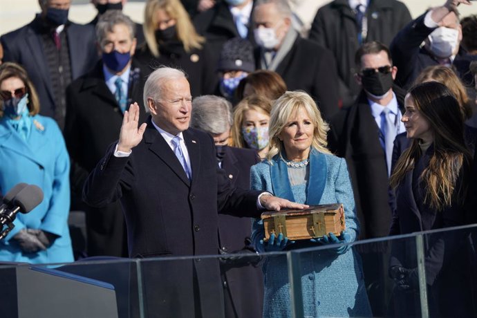 January 20, 2021 - Washington, DC, United States: United States President Joe Biden takes the Oath of Office as the 46th President of the US at the US Capitol in Washington, DC on Wednesday, January 20, 2021. (Chris Kleponis / CNP / Polaris)