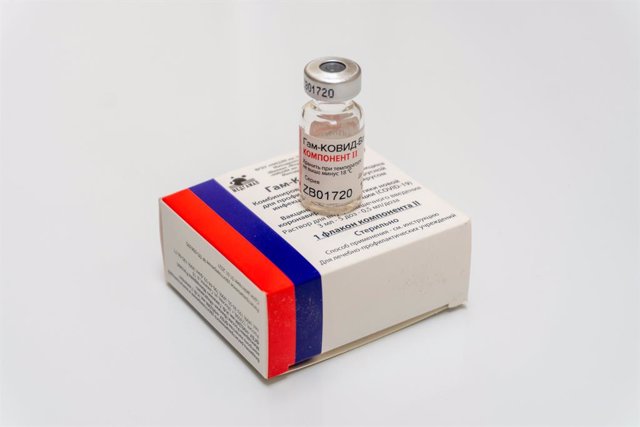 01 February 2021, Argentina, Buenos Aires: A vial of Russia's Sputnik V Covid-19 vaccine is pictured on top of its box.  The Russian-developed Sputnik V vaccine has been found to be 91.6-per-cent effective against Covid-19, according to a study publishe