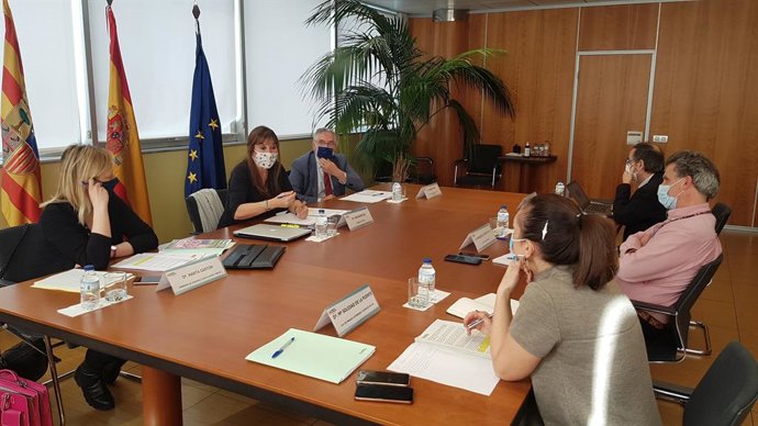 Gastón, Repollés y Olona en la reunión de hoy en el Departamento de Sanidad.