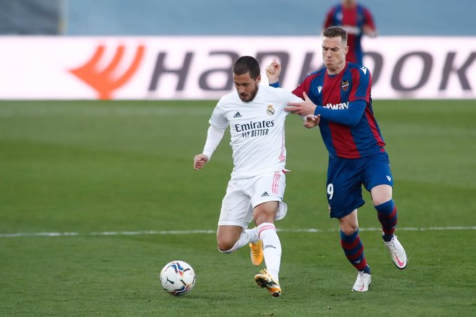Eden Hazard of Real Madrid and Carlos Clerc of Levante in action during the spanish league, La Liga Santander, football match played between Real Madrid and Levante UD at Ciudad Deportiva Real Madrid on january 30, 2021, in Valdebebas, Madrid, Spain.