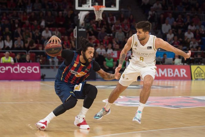 Henri (Baskonia) y Laprovittola (Real Madrid)