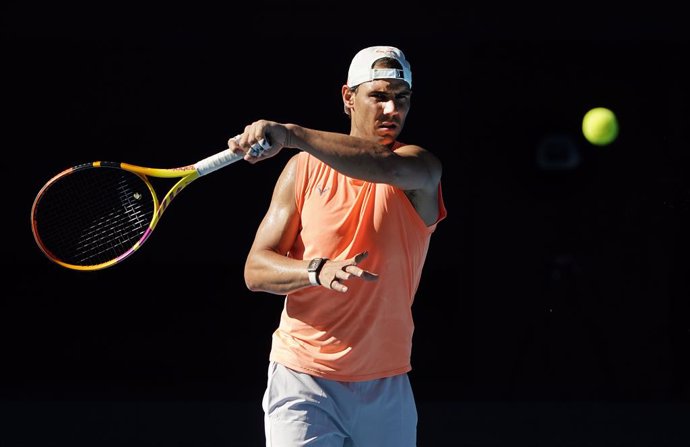 Rafael Nadal of Spain  returns during an Australian Open practice session at Melbourne Park in Melbourne, Sunday, January 31, 2021.  (AAP Image/Dave Hunt) NO ARCHIVING