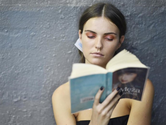 A Model Reads A Book Backstage Ahead Of The Selected Femme/Homme Fashion Show During The Bread & Butter By Zalando At Arena Berlin On September 3, 2016 In Berlin, Germany.