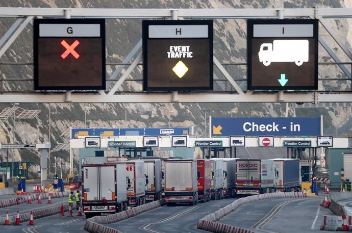 31 December 2020, England, Dover: Lorries arrive at the Port of Dover, the day that Britain leaves the EU single market and customs union. Photo: Gareth Fuller/PA Wire/dpa