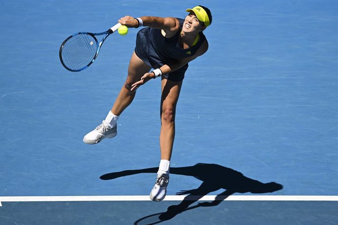 Garbine Muguruza of Spain in action during her first Round Women's singles match against Margarita Gasparyan of Russia on Day 2 of the Australian Open at Melbourne Park in Melbourne, Tuesday, February 9, 2021. (AAP Image/Dave Hunt) NO ARCHIVING, EDITORI