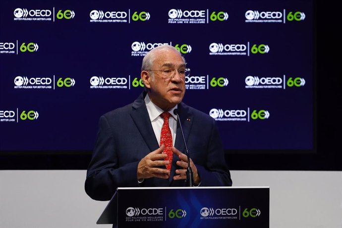 HANDOUT - 14 December 2020, France, Paris: OECD's Secretary General Angel Gurria delivers a speech during a ceremony marking the 60th anniversary of the creation of the Organisation for Economic Co-operation and Development (OECD) at its headquarters in