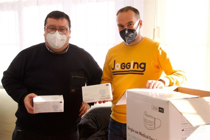 Luis Pacho, a la izquierda