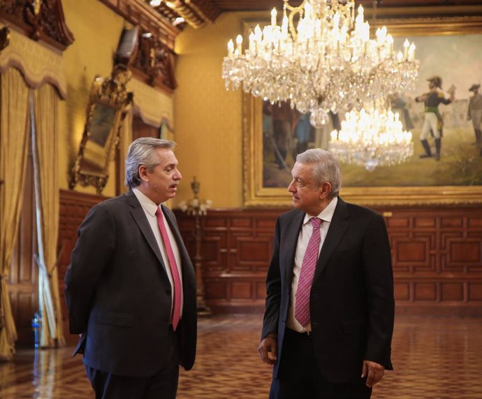 04 November 2019, Mexico, Mexico City: Argentinian President-elect Alberto Fernandez (L) speaks with Mexican President Andres Manuel Lopez Obrador during their meeting, at the National Palace, on his first trip as Argentina's elected president.  Alberto